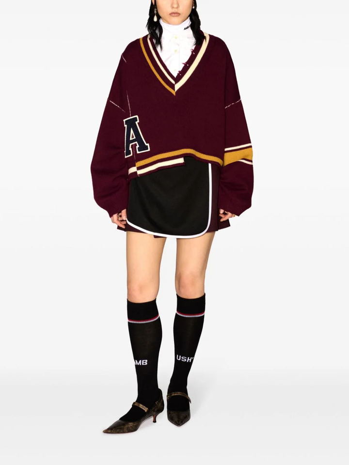 Áo len cổ V rách nhấn rib