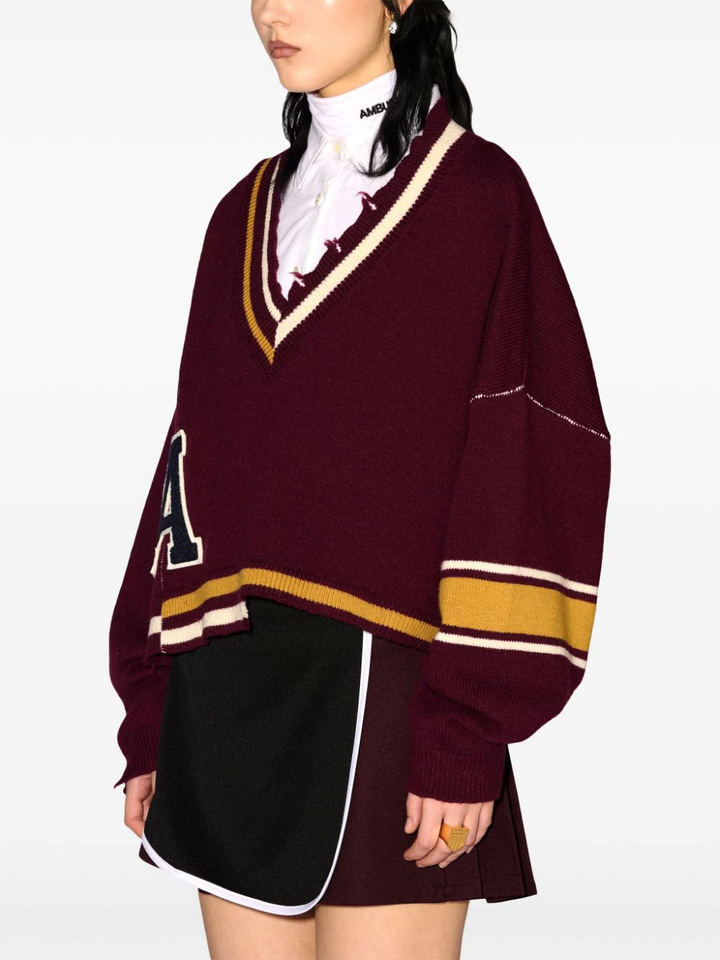 Áo len cổ V rách nhấn rib