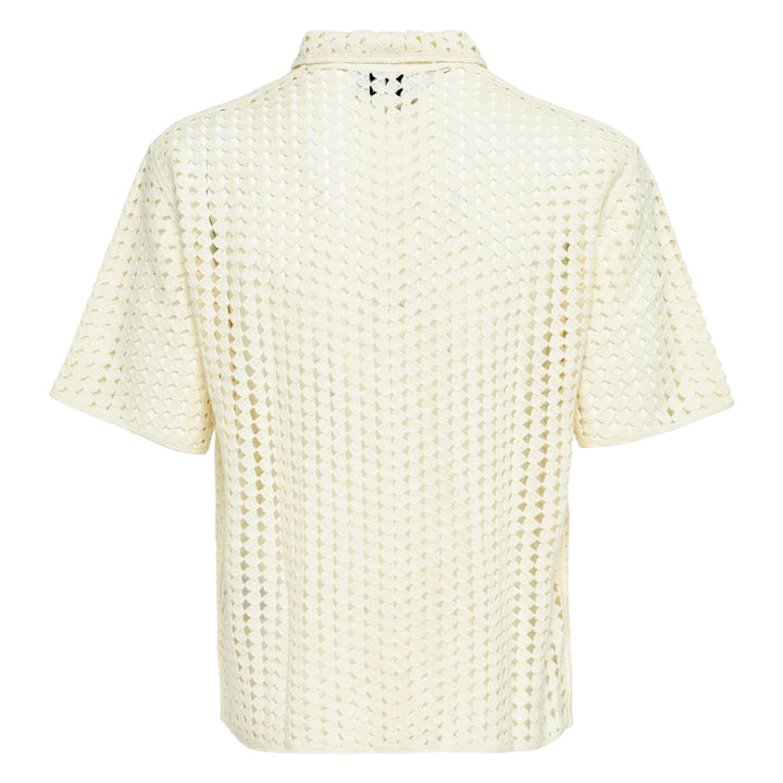 Áo sơ mi ngắn tay cắt xẻ