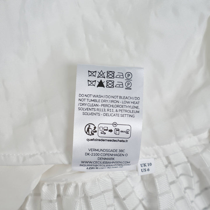 Áo không tay với đường viền bất đối xứng