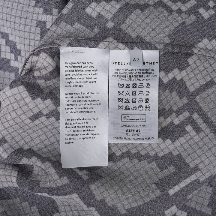 Áo sơ mi satin họa tiết rắn