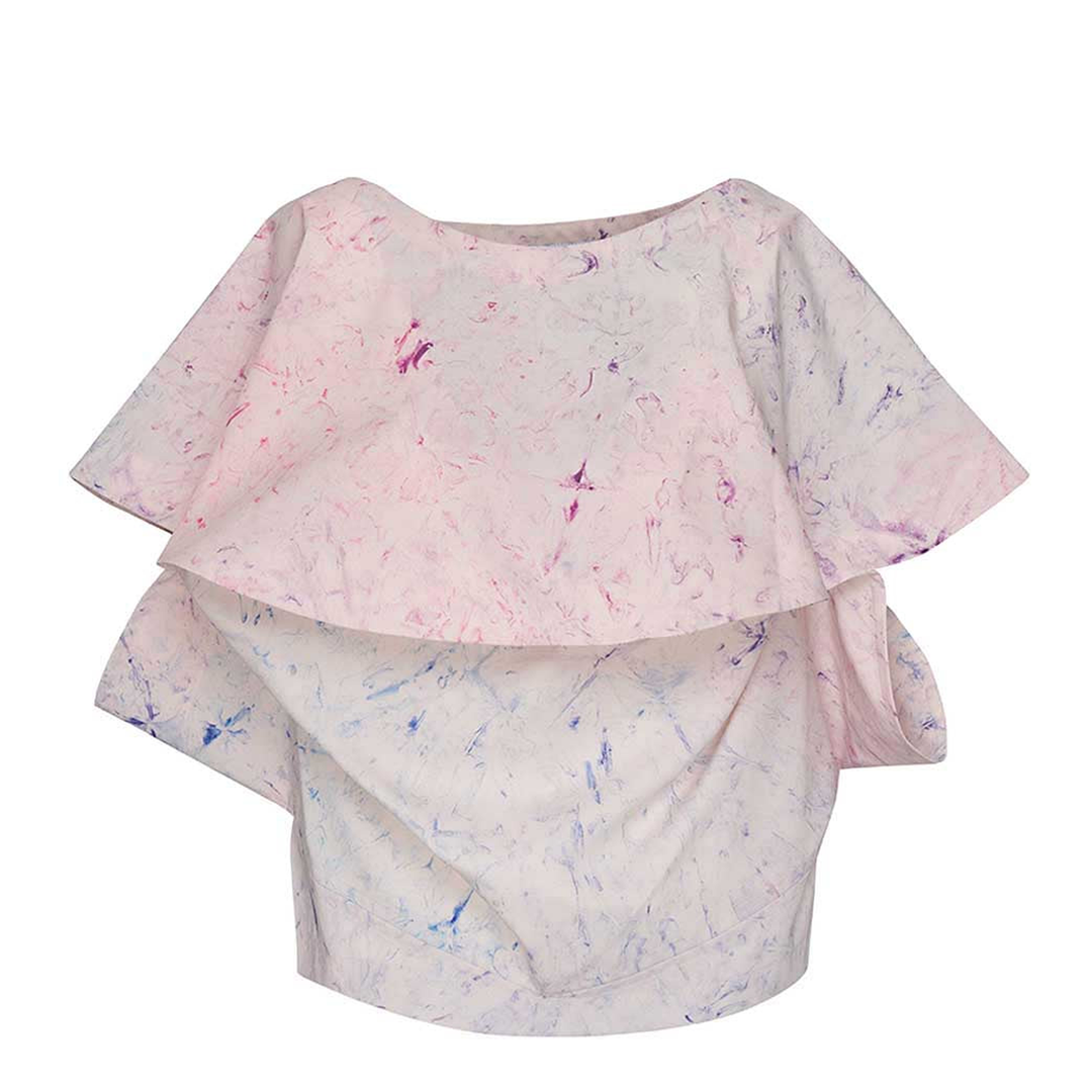 132 5. Issey Miyake Bubble Dye Ruffle Blouse in grey marble print with tiered ruffle overlay and boat neckline, flat lay on white background