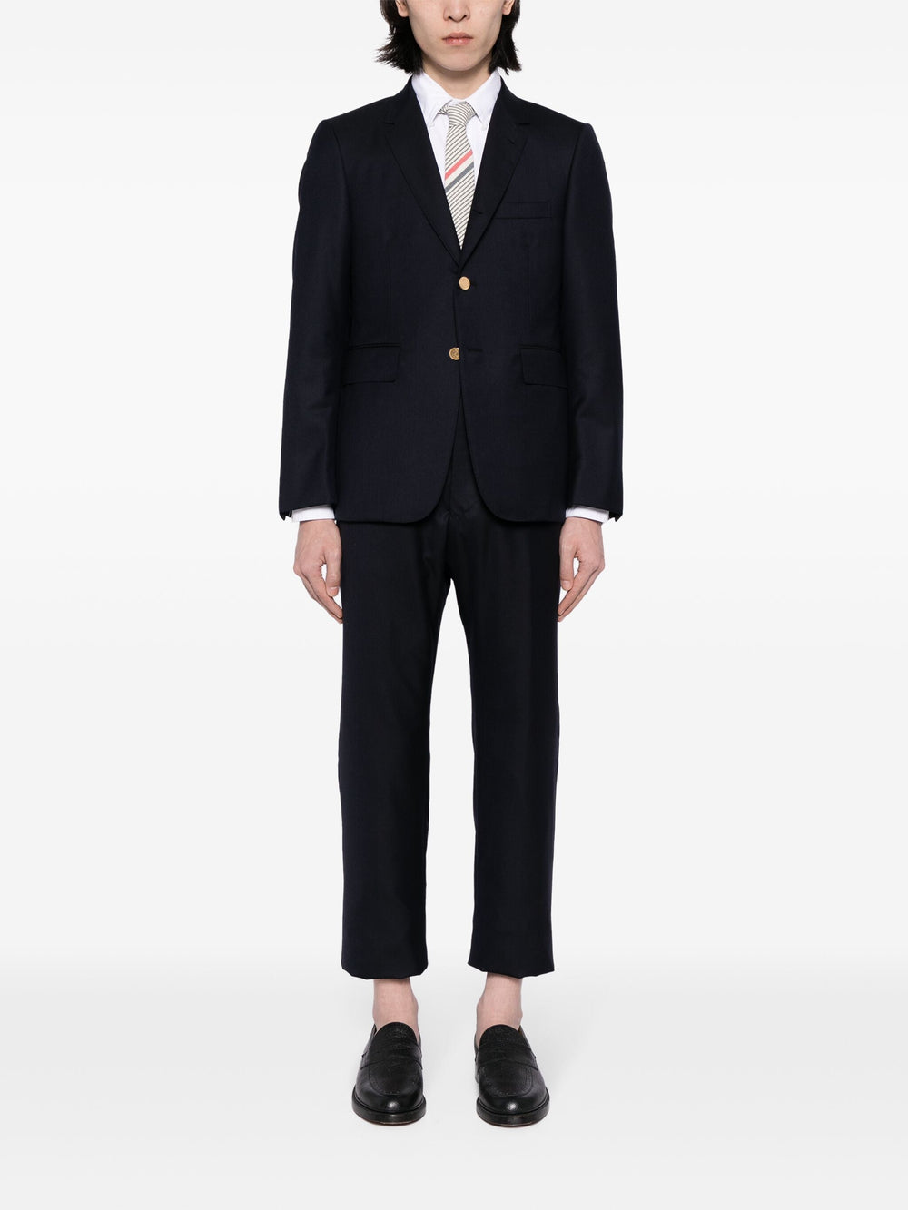 Thom Browne Back Strap Trousers in black — high-waisted straight-leg tailored pants, front view on white background