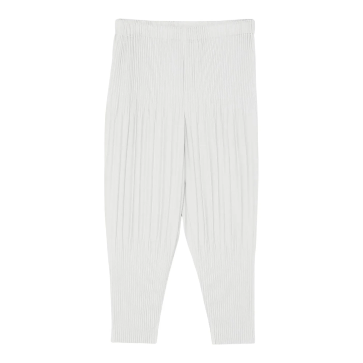 Homme Plissé Issey Miyake Fluffy Long Wide Pants in off-white with signature vertical pleating and elastic waistband, flat lay view