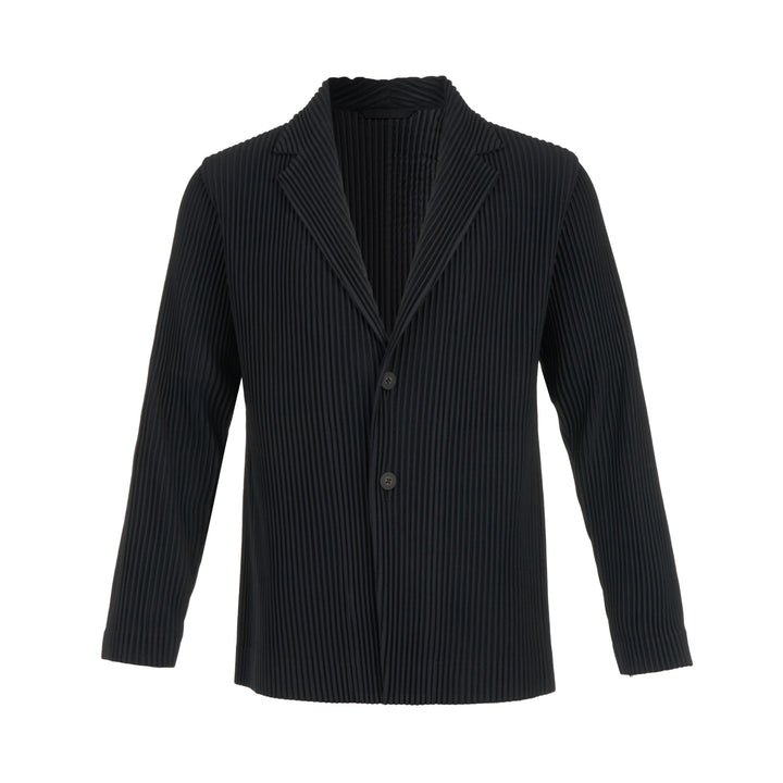 Homme Plissé Issey Miyake black pleated two-button blazer with notched lapels and all-over vertical pleated texture, front view on white background