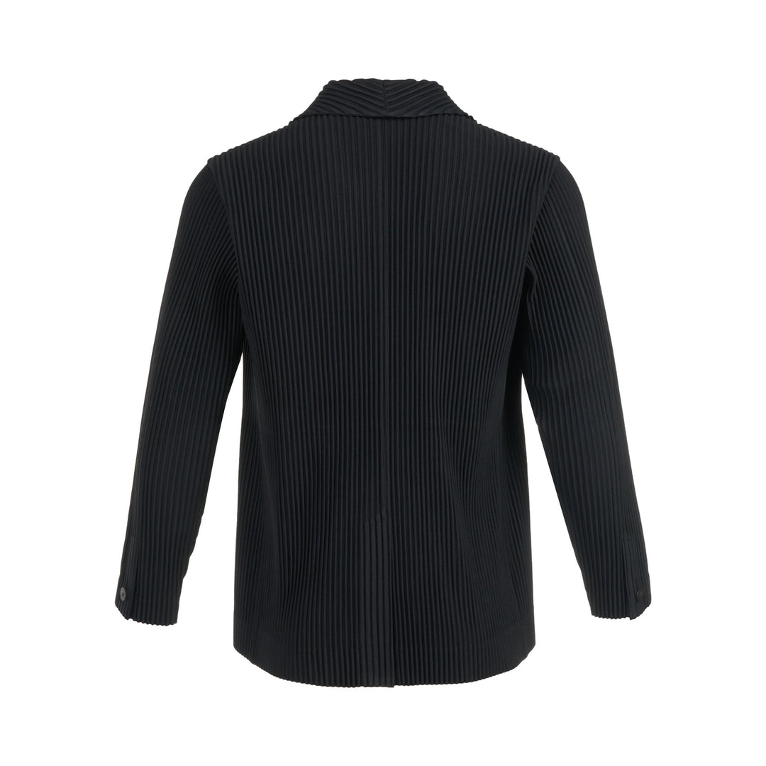 Homme Plissé Issey Miyake black pleated two-button blazer with notched lapels and all-over vertical pleated texture, front view on white background