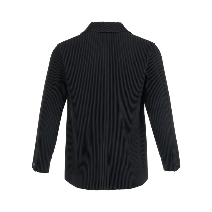 Homme Plissé Issey Miyake black pleated two-button blazer with notched lapels and all-over vertical pleated texture, front view on white background