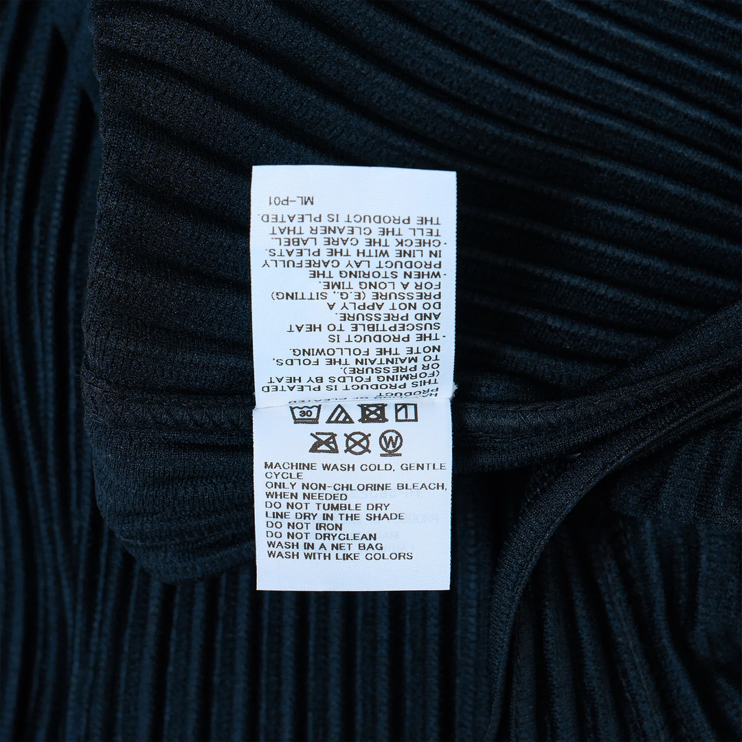 Homme Plissé Issey Miyake navy pleated long sleeve crew neck top with all-over vertical pleating on body and sleeves
