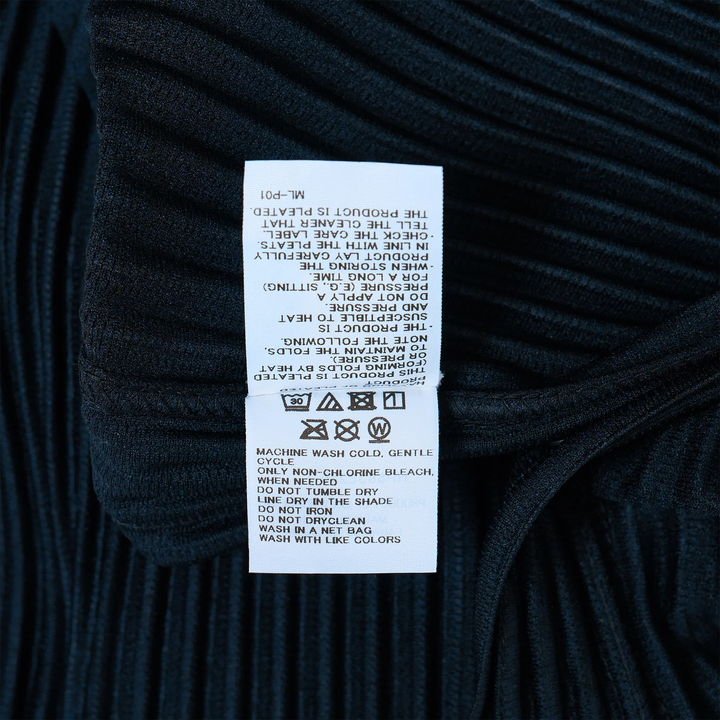Homme Plissé Issey Miyake navy pleated long sleeve crew neck top with all-over vertical pleating on body and sleeves
