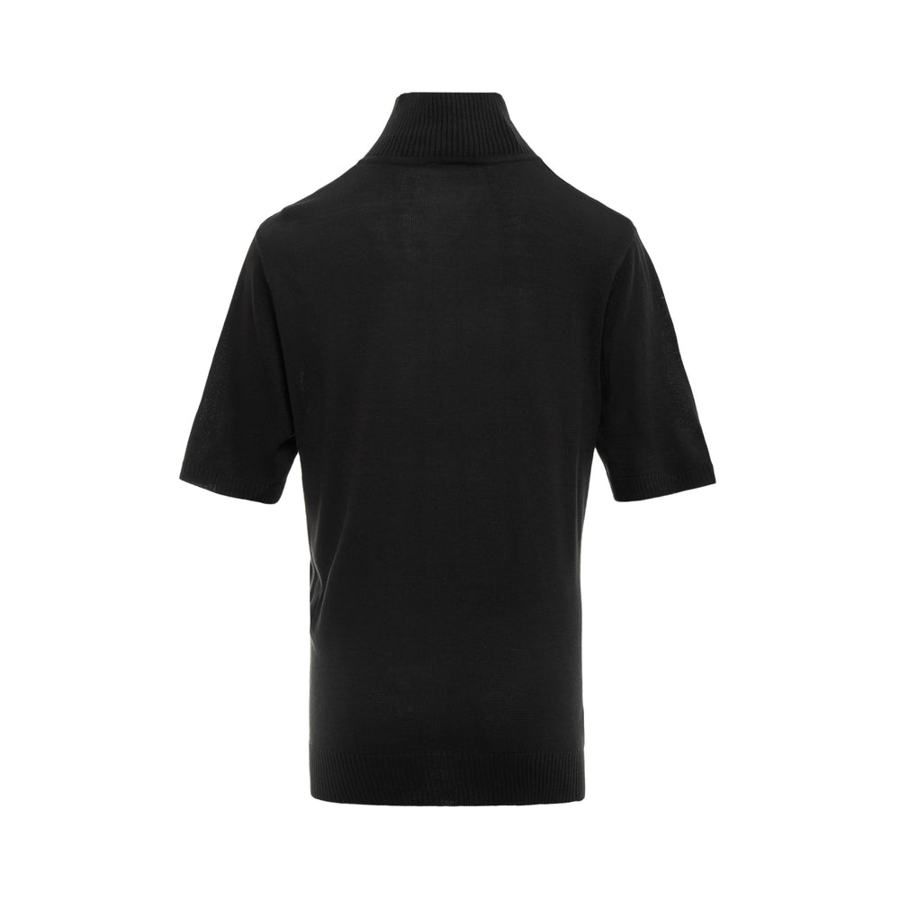Rally Movement black short-sleeve half-zip turtleneck knit polo top with silver RM monogram logo on chest and ribbed trim