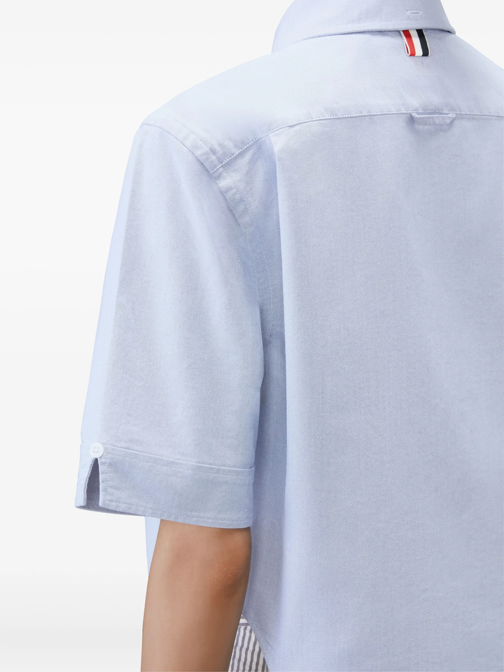 Thom Browne light blue cropped point collar short sleeve Oxford shirt with chest pocket and signature brand label