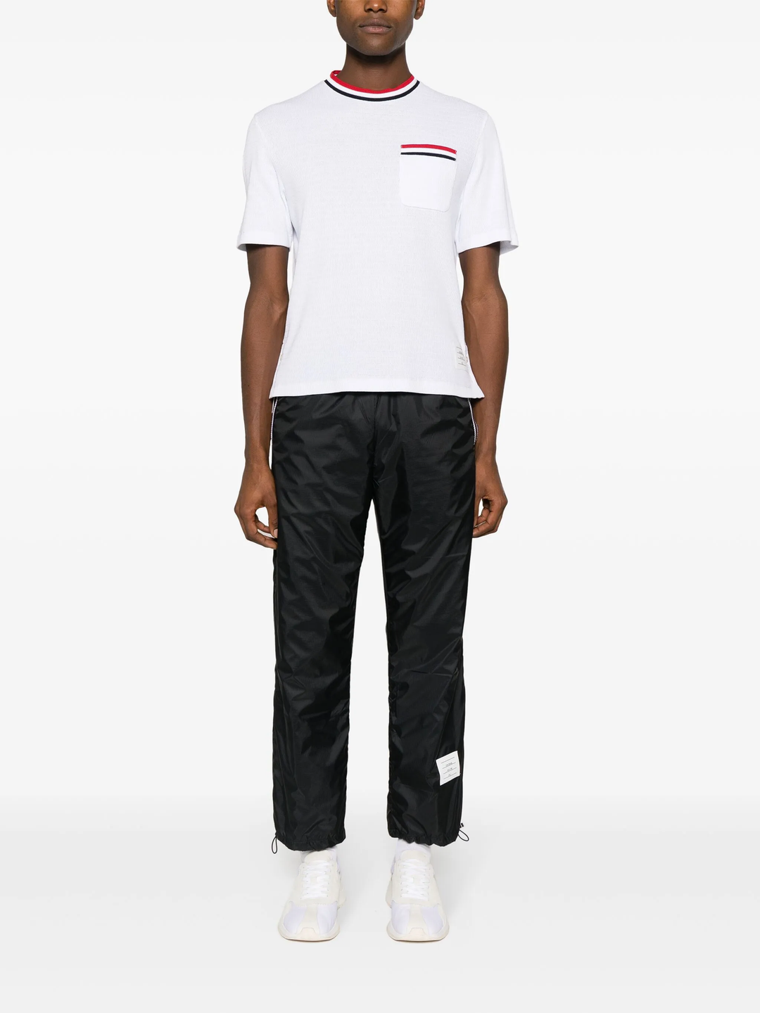 Thom Browne white short sleeve racking stitch crewneck tee with red, white, and navy stripe collar and chest pocket trim