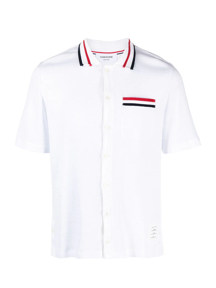 Thom Browne white short sleeve button down polo with RWB tipped ribbed collar and matching chest pocket stripe detail