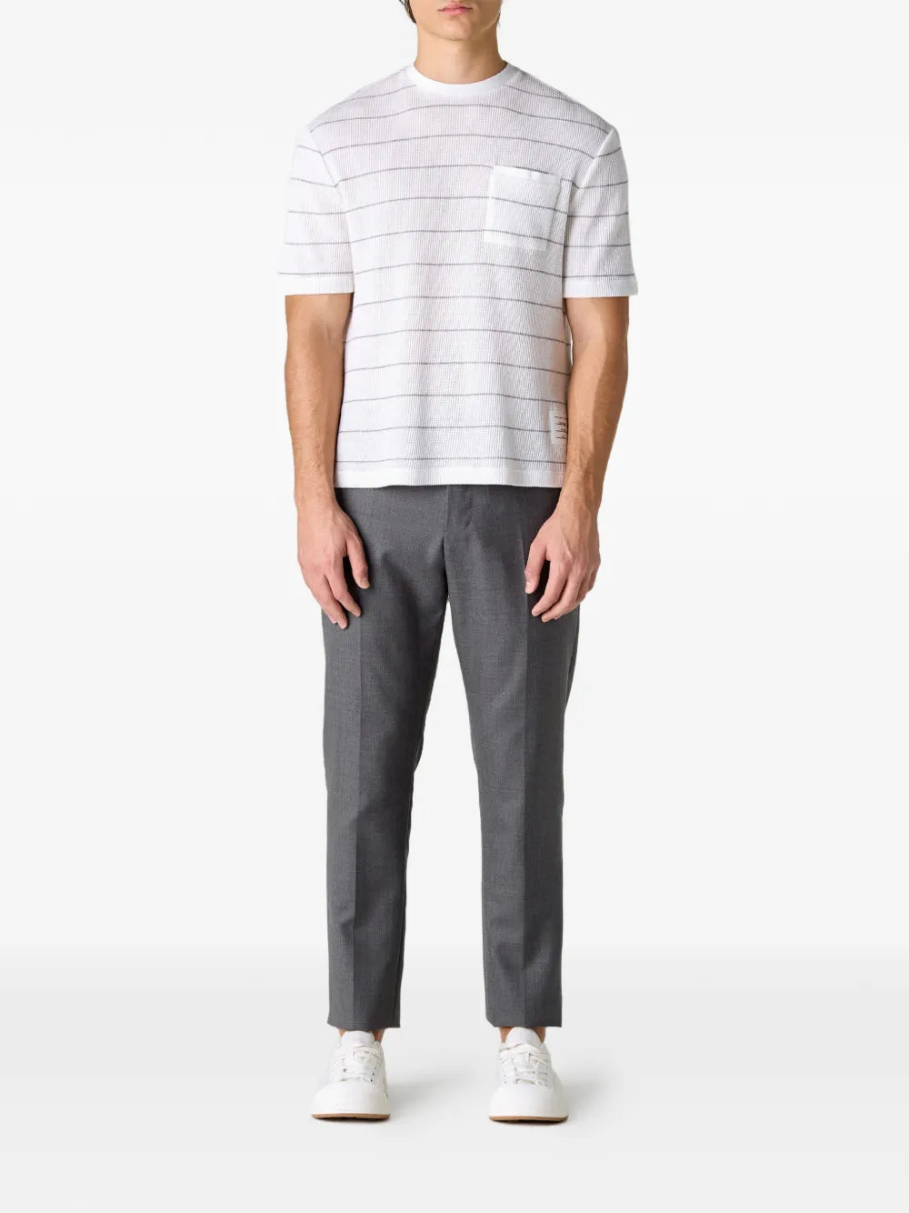 Thom Browne Textured Stripe Short Sleeve Tee in white with horizontal stripes, chest pocket, and tricolor side vent detail