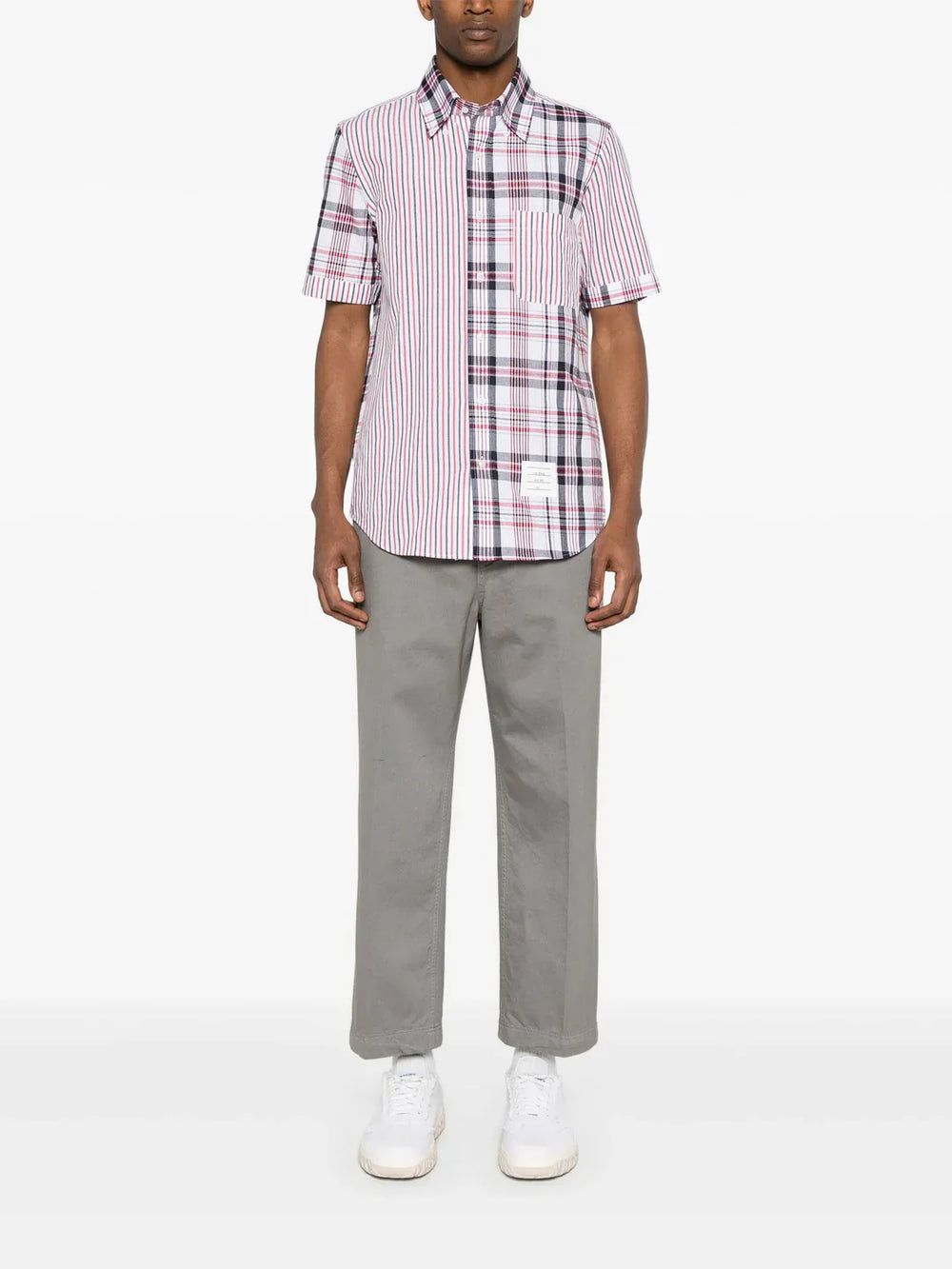 Thom Browne Utility Chino Trouser in grey with wide-leg silhouette, integrated belt, and pressed centre creases, displayed flat on white background