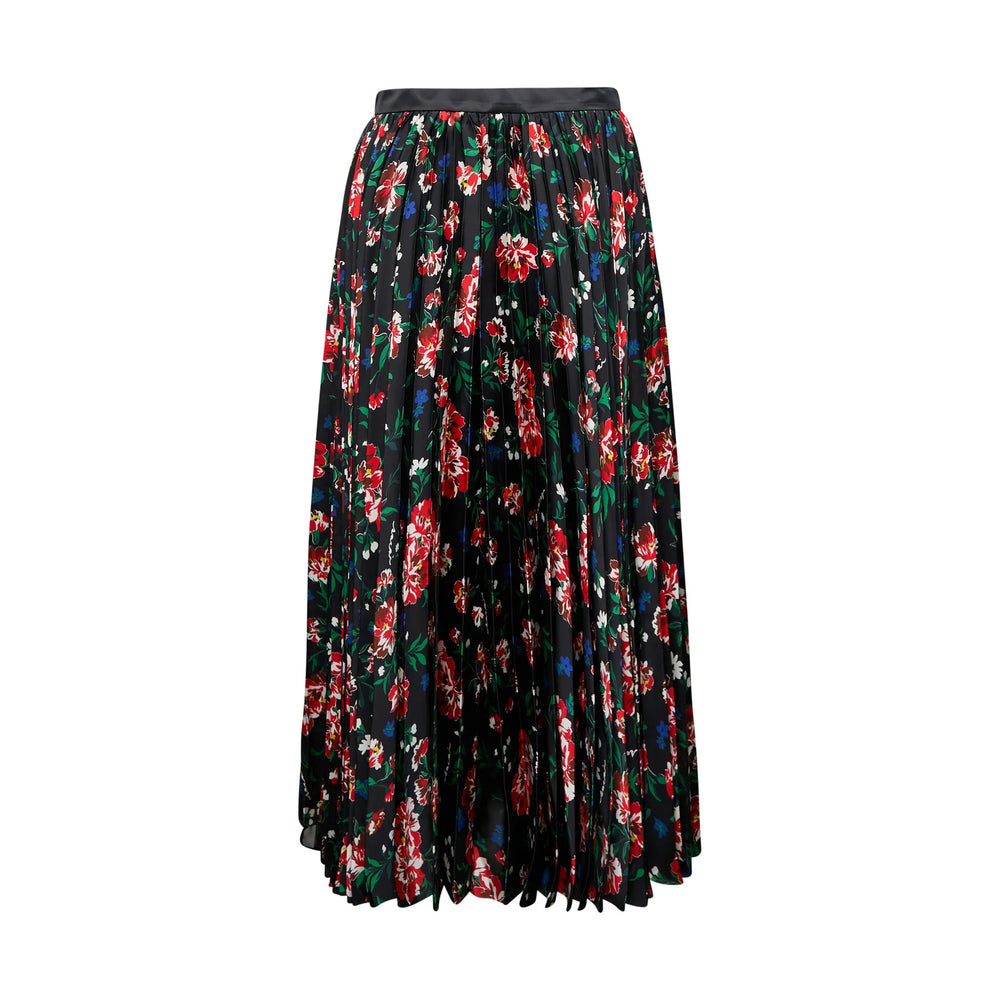 sacai Pattern Mix Pleated Skirt featuring a dark floral print panel alongside a multicolour stripe panel, with allover knife pleating and an asymmetric midi length