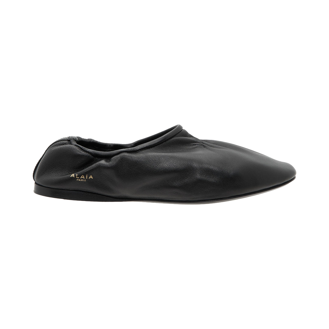 ALAÏA Black Leather Slippers – Available at Club 21, Official Retailer in Singapore, Malaysia & Thailand with Global Shipping Online