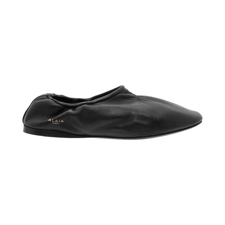 ALAÏA Black Leather Slippers – Available at Club 21, Official Retailer in Singapore, Malaysia & Thailand with Global Shipping Online
