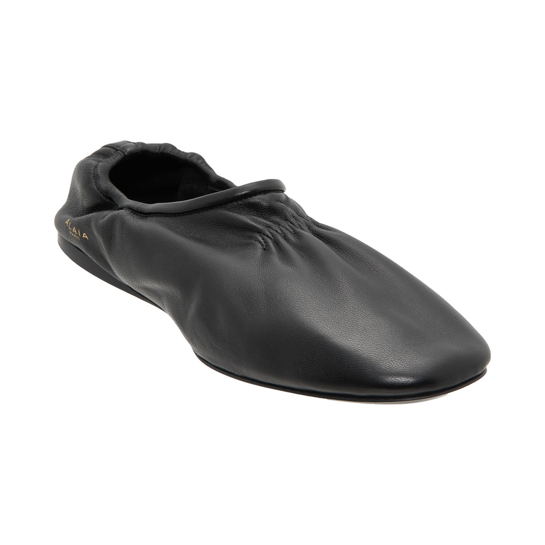 ALAÏA Black Leather Slippers – Available at Club 21, Official Retailer in Singapore, Malaysia & Thailand with Global Shipping Online