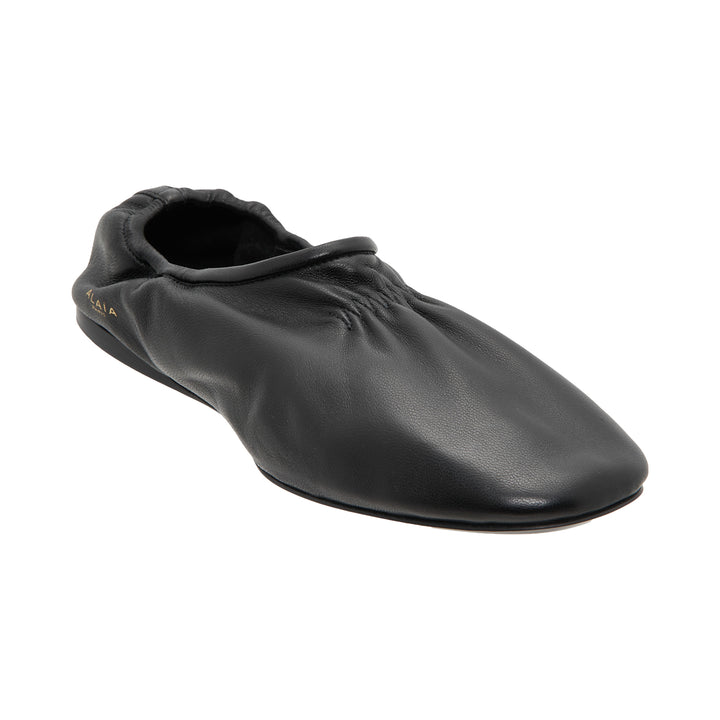 ALAÏA Black Leather Slippers – Available at Club 21, Official Retailer in Singapore, Malaysia & Thailand with Global Shipping Online