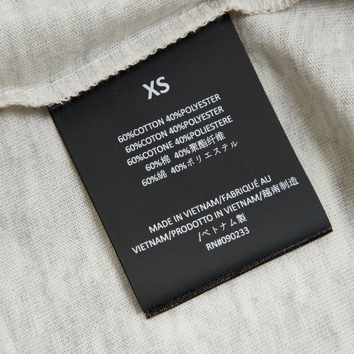 Fear of God Essentials Women's Signature Classic Tee in heather grey marl with crew neckline and short sleeves