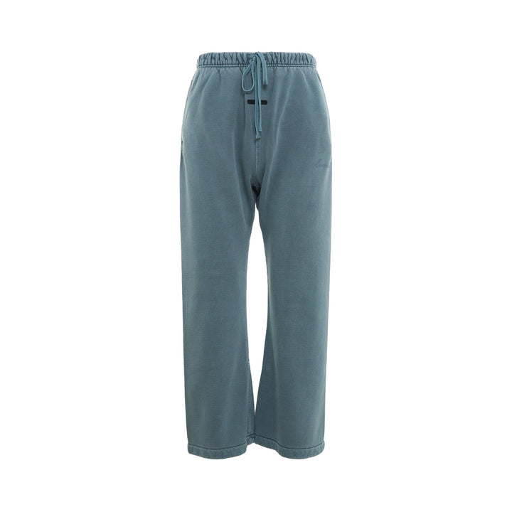 Fear of God Essentials Signature Flare Sweatpant in washed teal with elasticated drawstring waistband and wide-leg silhouette