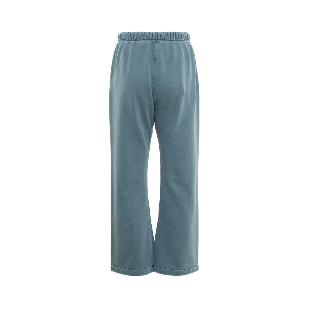 Fear of God Essentials Signature Flare Sweatpant in washed teal with elasticated drawstring waistband and wide-leg silhouette