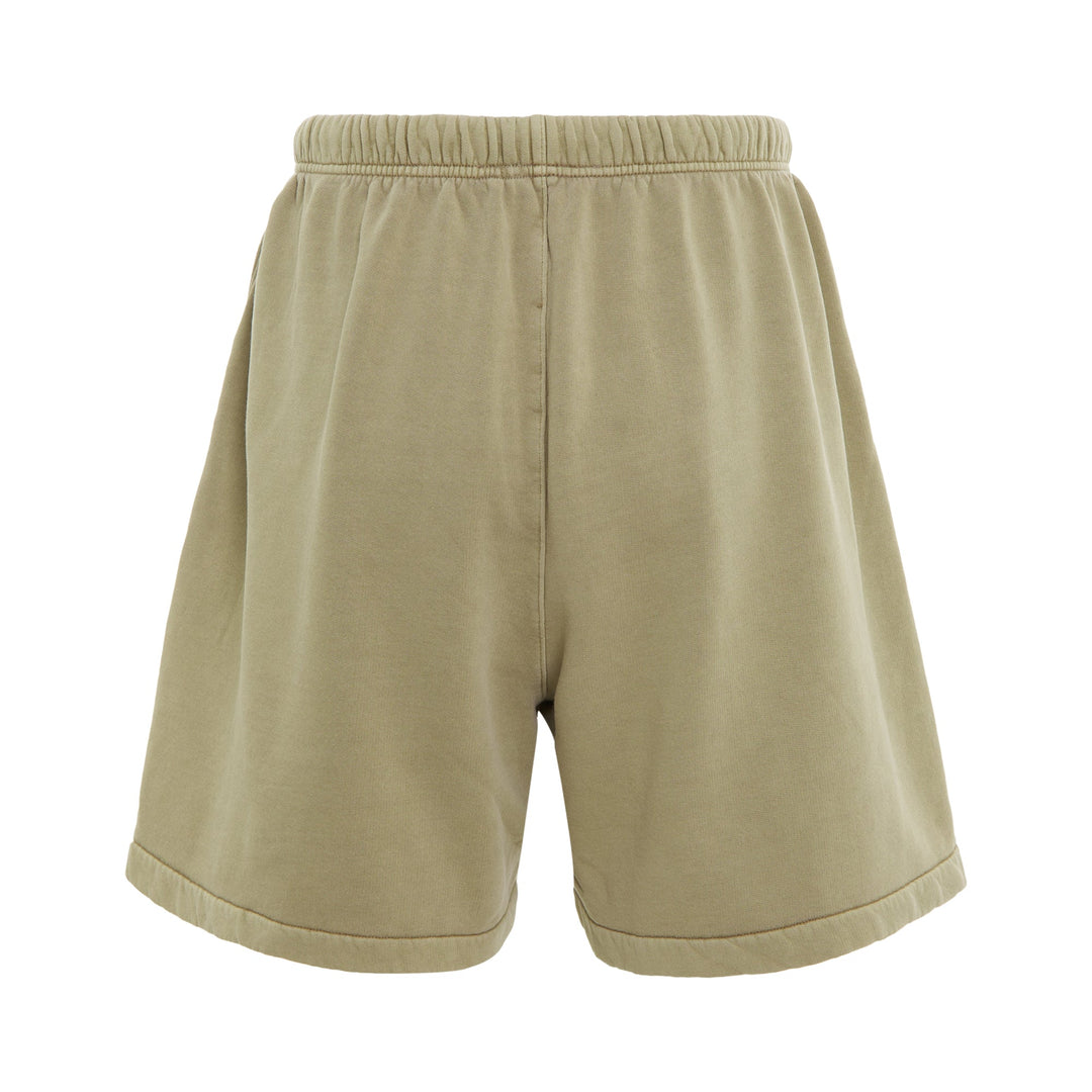 Fear of God Essentials Training Classic Fit Short in olive green with elasticated drawstring waistband and script logo embroidery on leg