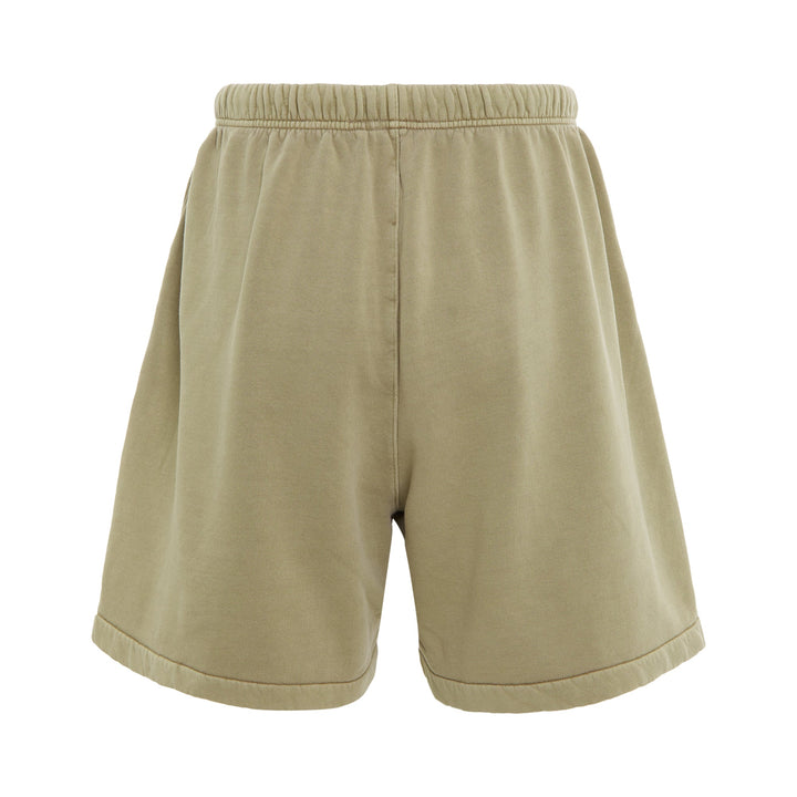 Fear of God Essentials Training Classic Fit Short in olive green with elasticated drawstring waistband and script logo embroidery on leg