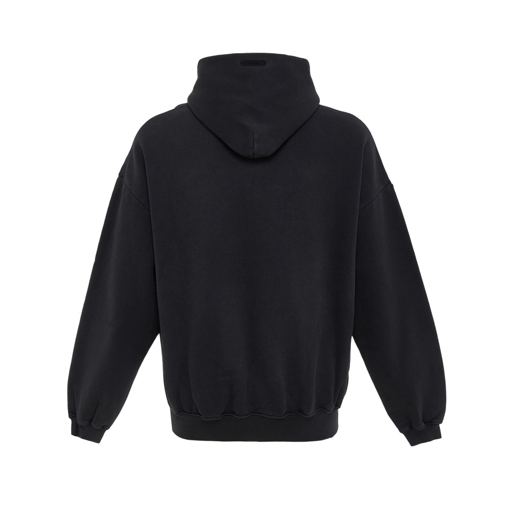 Fear of God ESSENTIALS black oversized graphic hoodie with arch logo print on chest