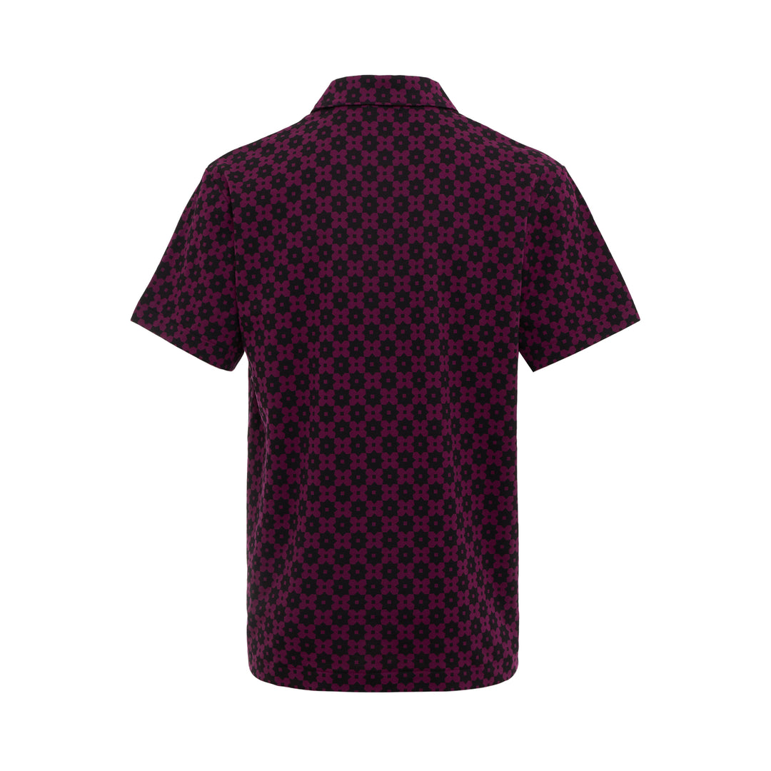 COMME des GARÇONS HOMME PLUS Floral Print Polo Shirt in deep magenta and black all-over geometric floral pattern