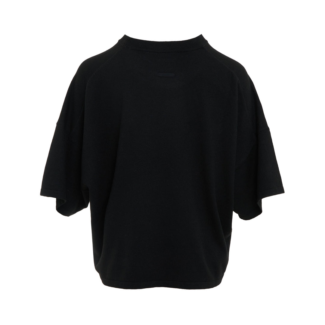 Fear of God ESSENTIALS Women's Boxy Knit Tee in black with wide flutter sleeves and ribbed crew neckline