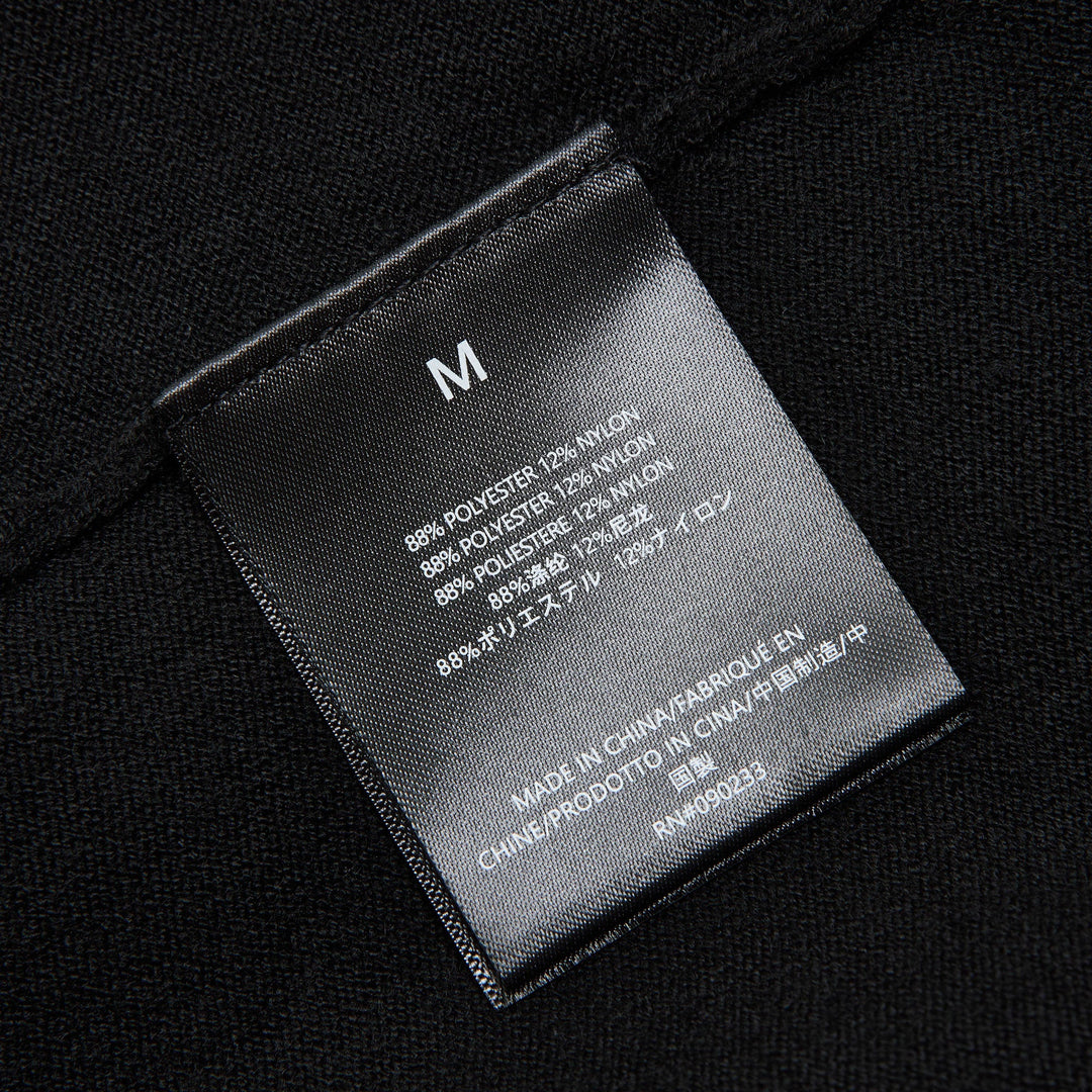 Fear of God ESSENTIALS Women's Boxy Knit Tee in black with wide flutter sleeves and ribbed crew neckline