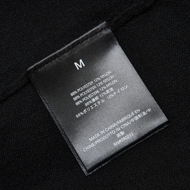 Fear of God ESSENTIALS Women's Boxy Knit Tee in black with wide flutter sleeves and ribbed crew neckline