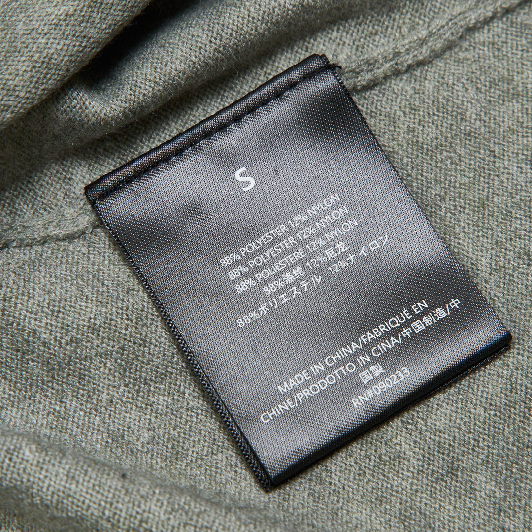Fear of God ESSENTIALS Women's Boxy Knit Tee in heather grey with wide short sleeves and ribbed mock neckline, flat lay on white background