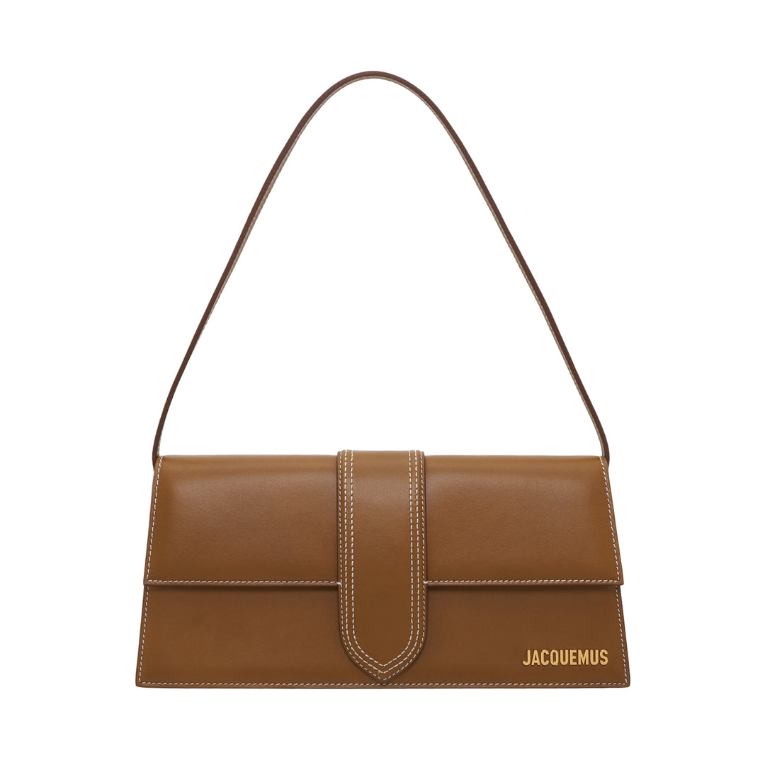 JACQUEMUS Le Bambino Long shoulder bag in tan smooth leather with white contrast stitching, central tab closure, and gold logo lettering