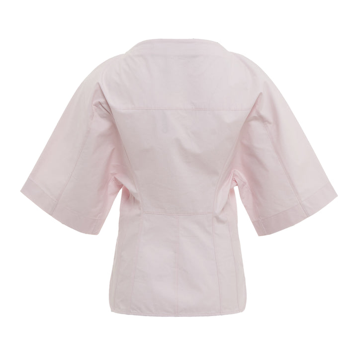 Jacquemus La Chemise Moisson Blouse in light blush pink with wide structured sleeves and fitted waist, back view