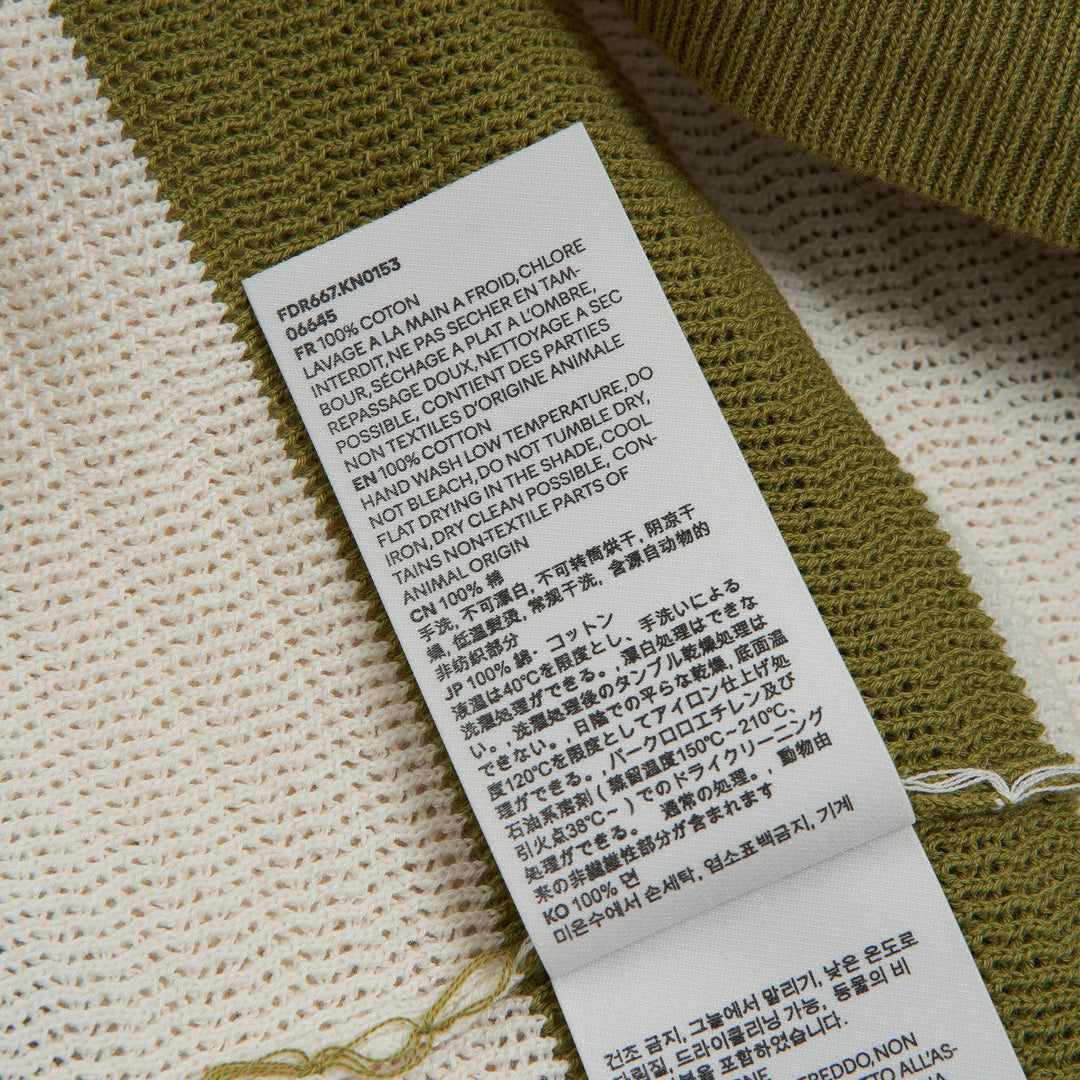 AMI Striped Knit Polo Dress in olive green and cream horizontal stripes with signature heart logo patch and polo collar