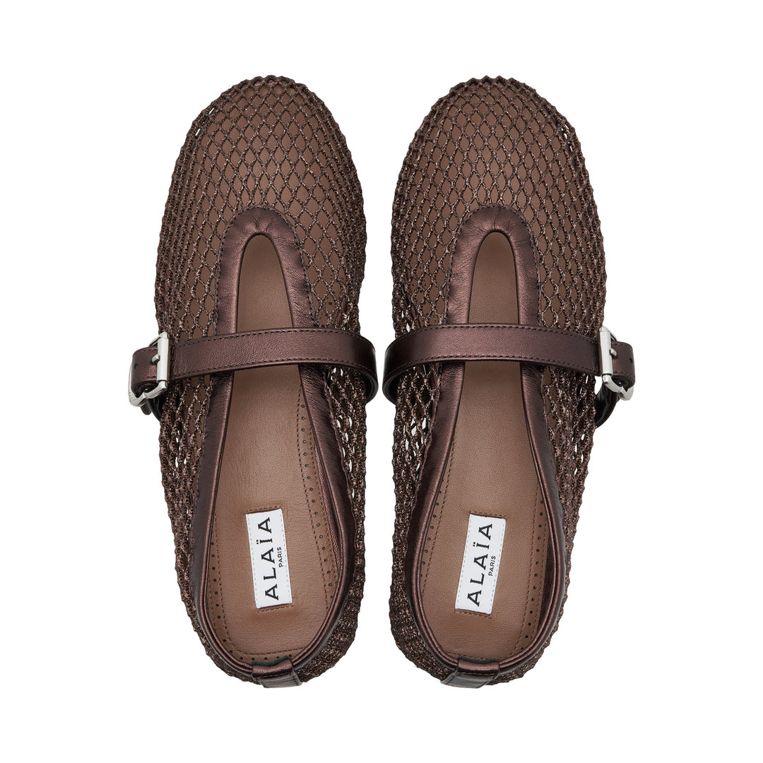Alaïa dark brown open-weave mesh ballet flat with leather Mary Jane strap and silver buckle, square toe, side profile view