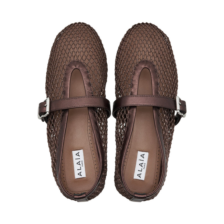 Alaïa dark brown open-weave mesh ballet flat with leather Mary Jane strap and silver buckle, square toe, side profile view