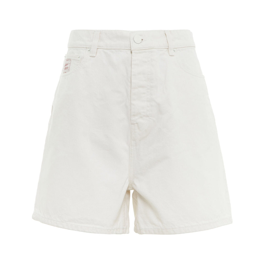 AMI Paris Heritage Denim Shorts in off-white with high-rise waist, five-pocket design, and signature heritage label patch