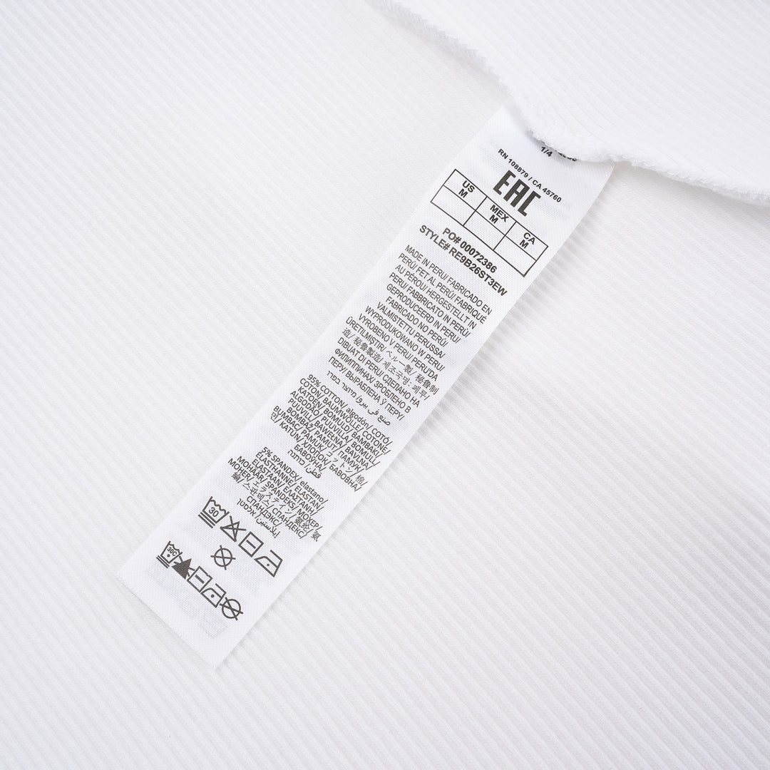 rag & bone Essential Rib Long Sleeve Crew in white, featuring a slim ribbed silhouette, elevated crew neckline, and ribbed cuffs - view 3
