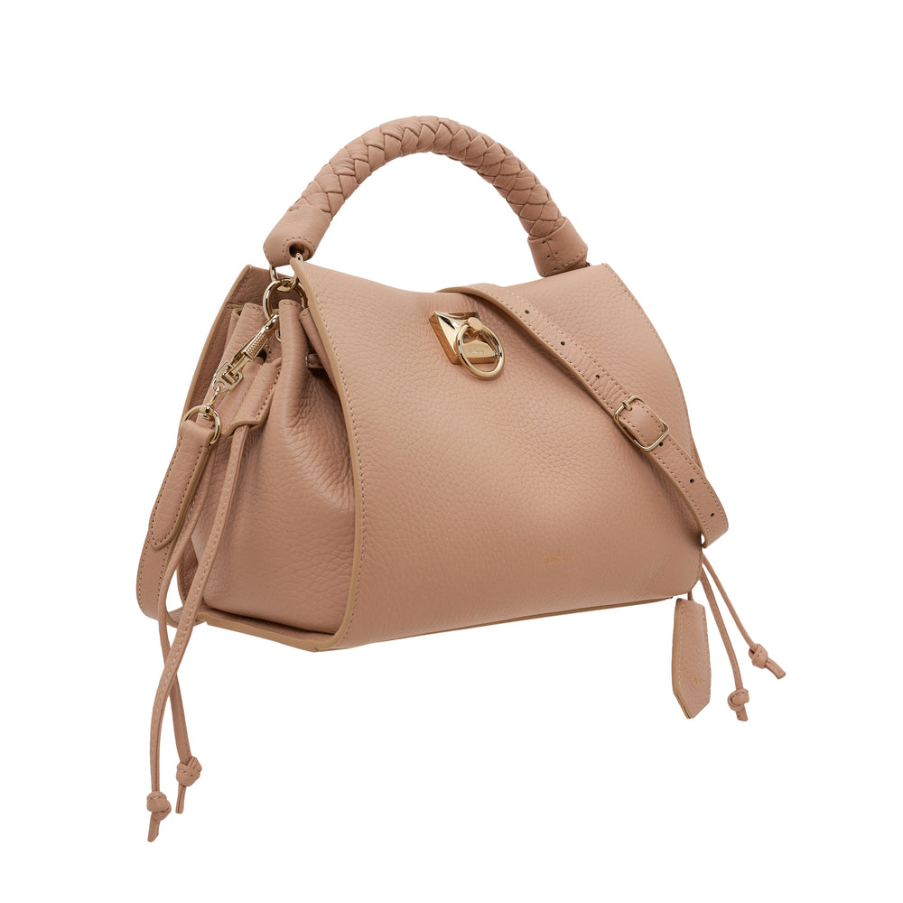 Mulberry Small Iris top handle bag in nude pebbled leather with braided handle, gold ring-lock closure, adjustable crossbody strap, and tassel charm detail