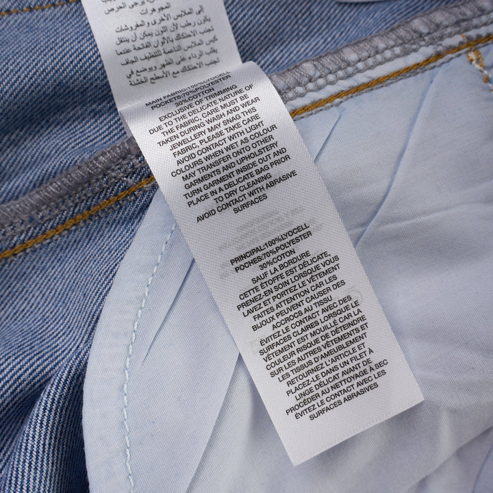 Self-Portrait light blue wide-leg jeans with rhinestone pinstripes and embroidered bow motifs on a white background - view 8
