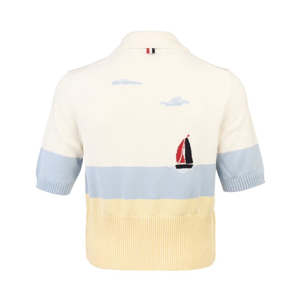 Thom Browne Short Sleeve Sailboat Polo in ivory, sky blue, and pale yellow, featuring intarsia cloud motifs and an embroidered sailboat detail at the chest, with a three-button placket and ribbed hem - view 2