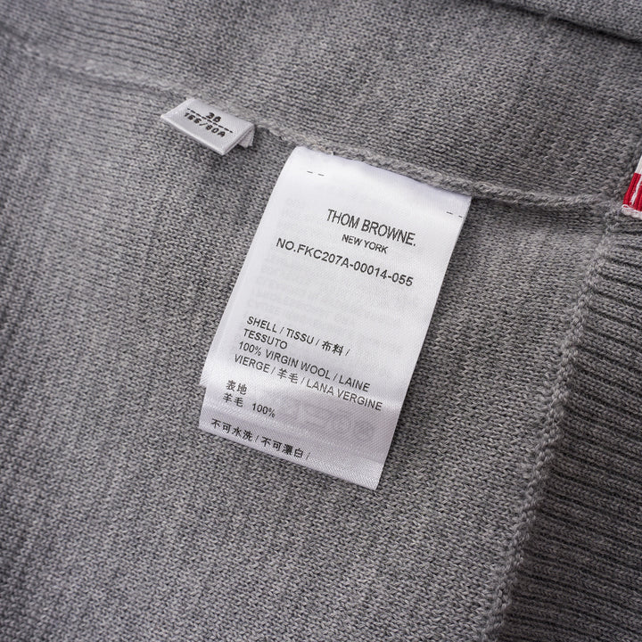 Thom Browne heather grey V-neck cardigan with four-bar white stripe detail on sleeve, button-through front, and ribbed hem and cuffs - view 3