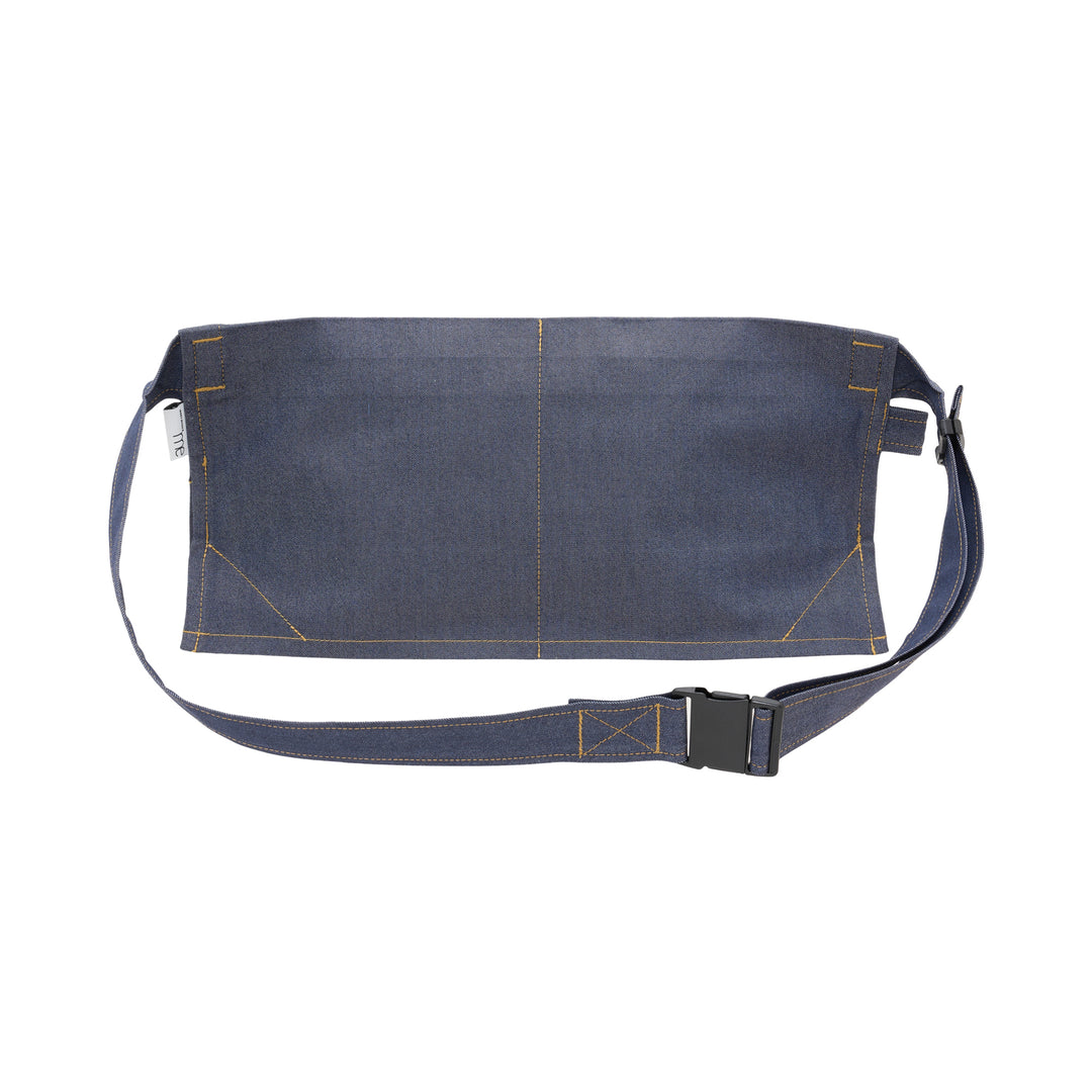 me Issey Miyake Flat Denim Belt Bag in chambray blue with contrast golden stitching, a navy button closure, and an adjustable buckle strap, shown against a white background - view 3