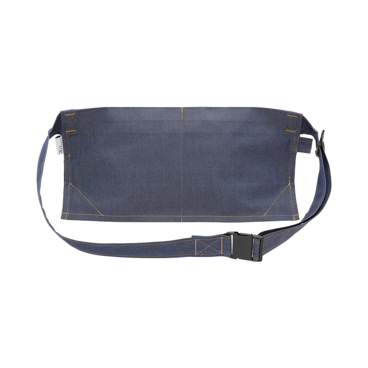 me Issey Miyake Flat Denim Belt Bag in chambray blue with contrast golden stitching, a navy button closure, and an adjustable buckle strap, shown against a white background - view 3