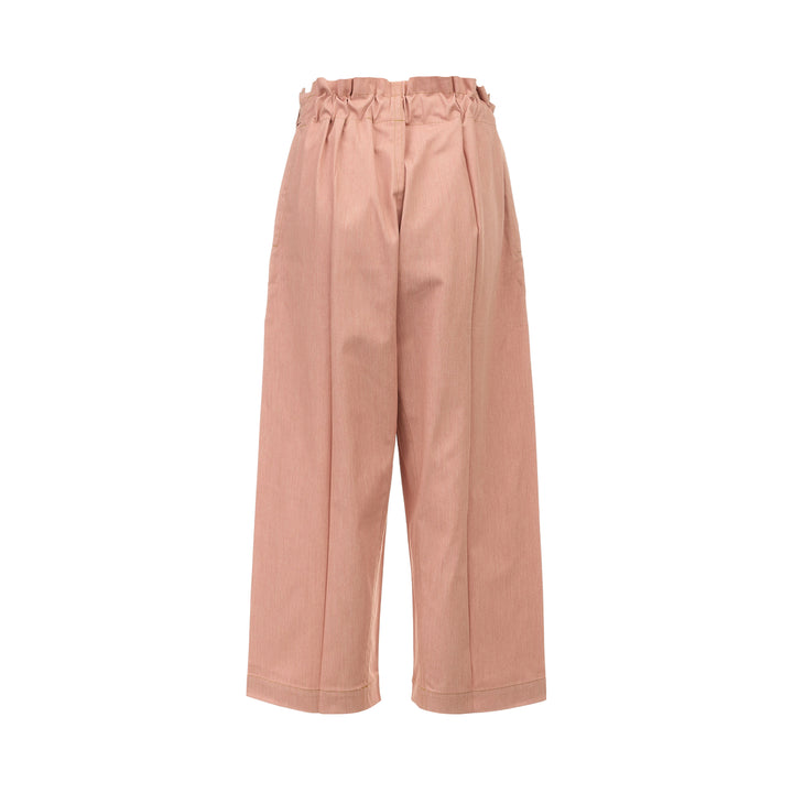 me Issey Miyake Flat Denim Seasonal Pants in dusty rose — wide-leg culotte silhouette with front pleats, utility clip buckle waistband, and cuffed hem, shown flat against a white background - view 2