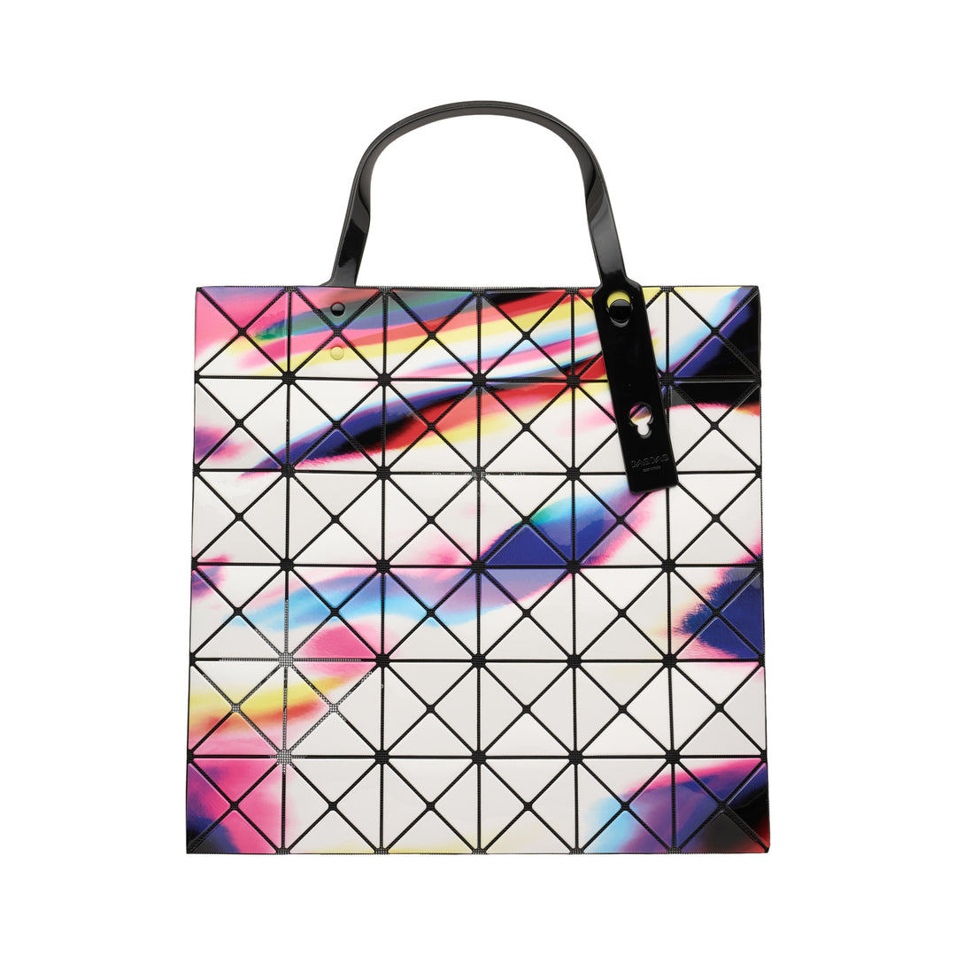 Bao Bao Issey Miyake Warp Tote Bag in a 6×6 geometric panel grid featuring an iridescent multicolour print of pink, violet, cobalt, and amber, with a black patent top handle on a white background